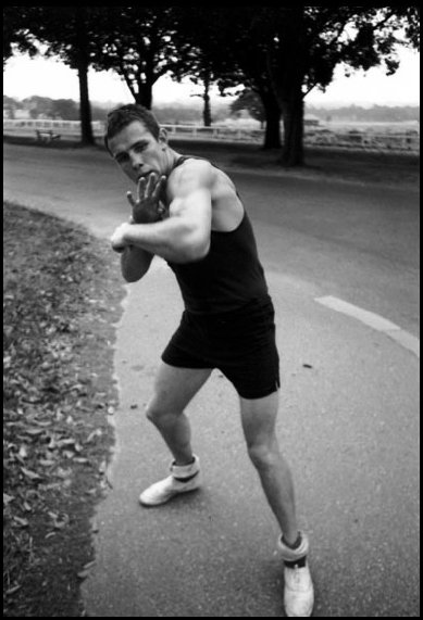 Australian Empire Light-heavyweight boxing champion  Bob Dunlop shadowboxing in Centennial Park Sydney in early morning - 1966