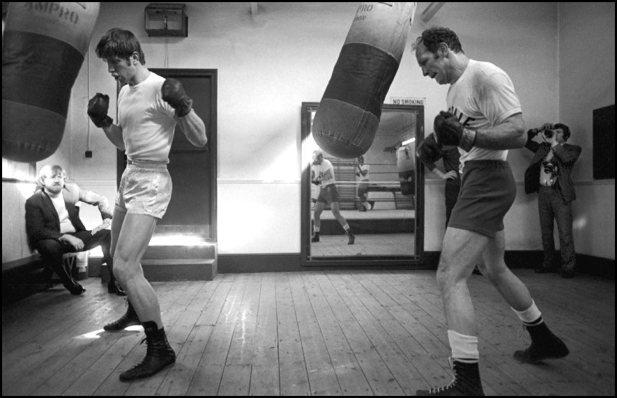 Heavyweight boxer Henry Cooper (R) with sparring partner Hampstead London - 1970