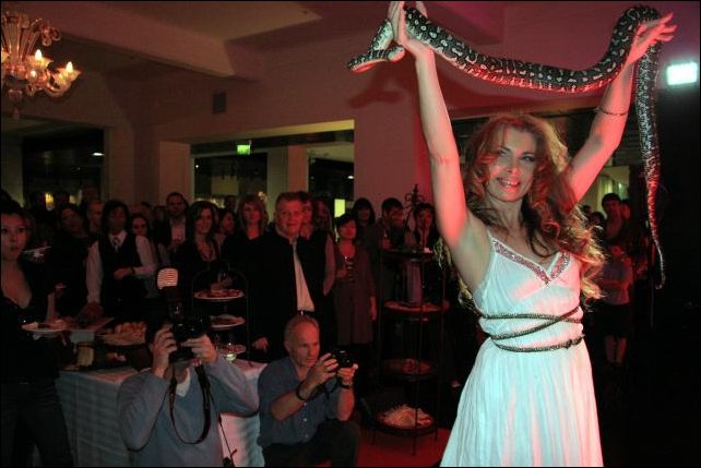 Dancer Daria and her diamond python Mustapha at Customs House - Photograph by Robert McFarlane