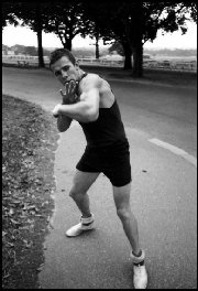 Australian Empire Light-heavyweight boxing champion  Bob Dunlop shadowboxing in Centennial Park Sydney in early morning - 1966